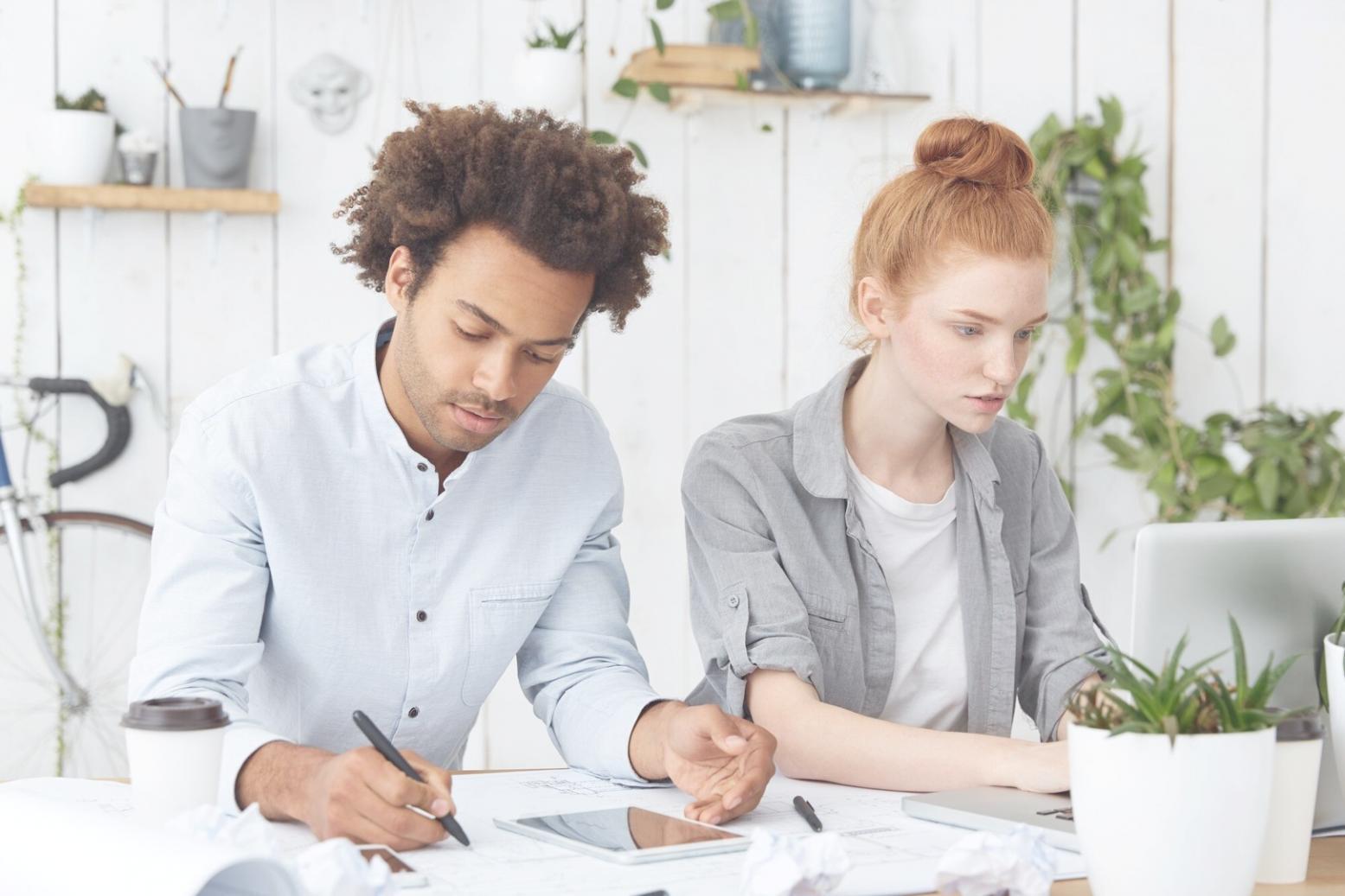 Financial analyst reviewing budget reports and data accuracy checks
